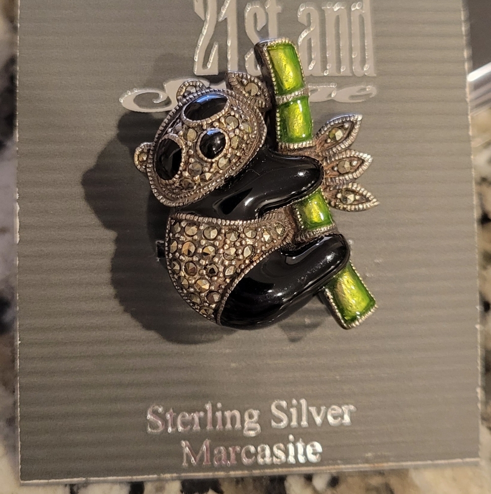 Silver and marcasite panda pin, new in box